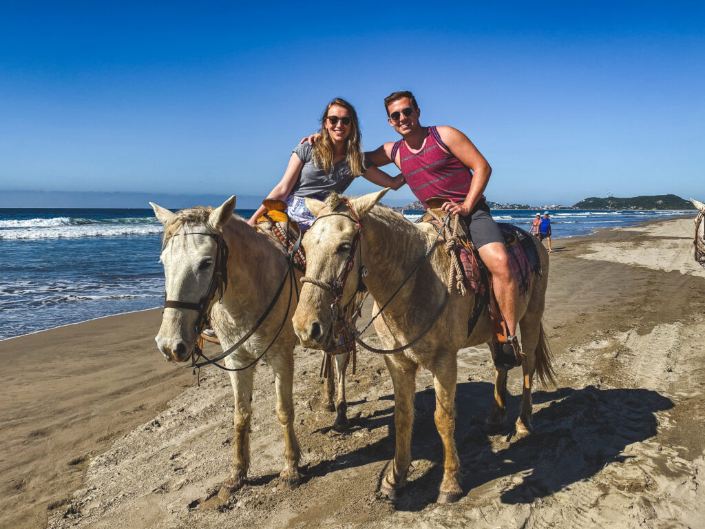 Horseback riding on the beach in Mazatlán, Mexico is a must