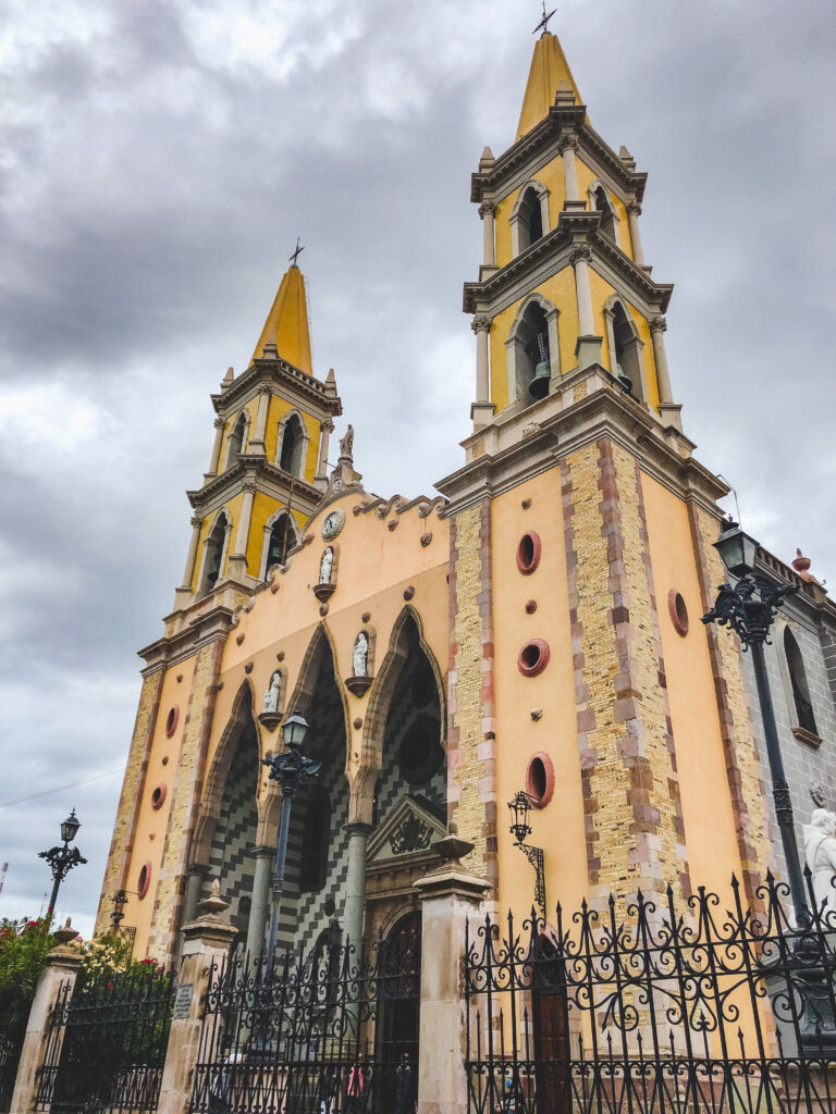 The main Cathedral in Mazatlán stands out with its yellow colour