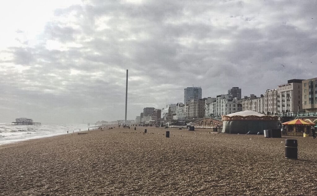 Here you can see both the West Pier and the i360 Tower down the beach.