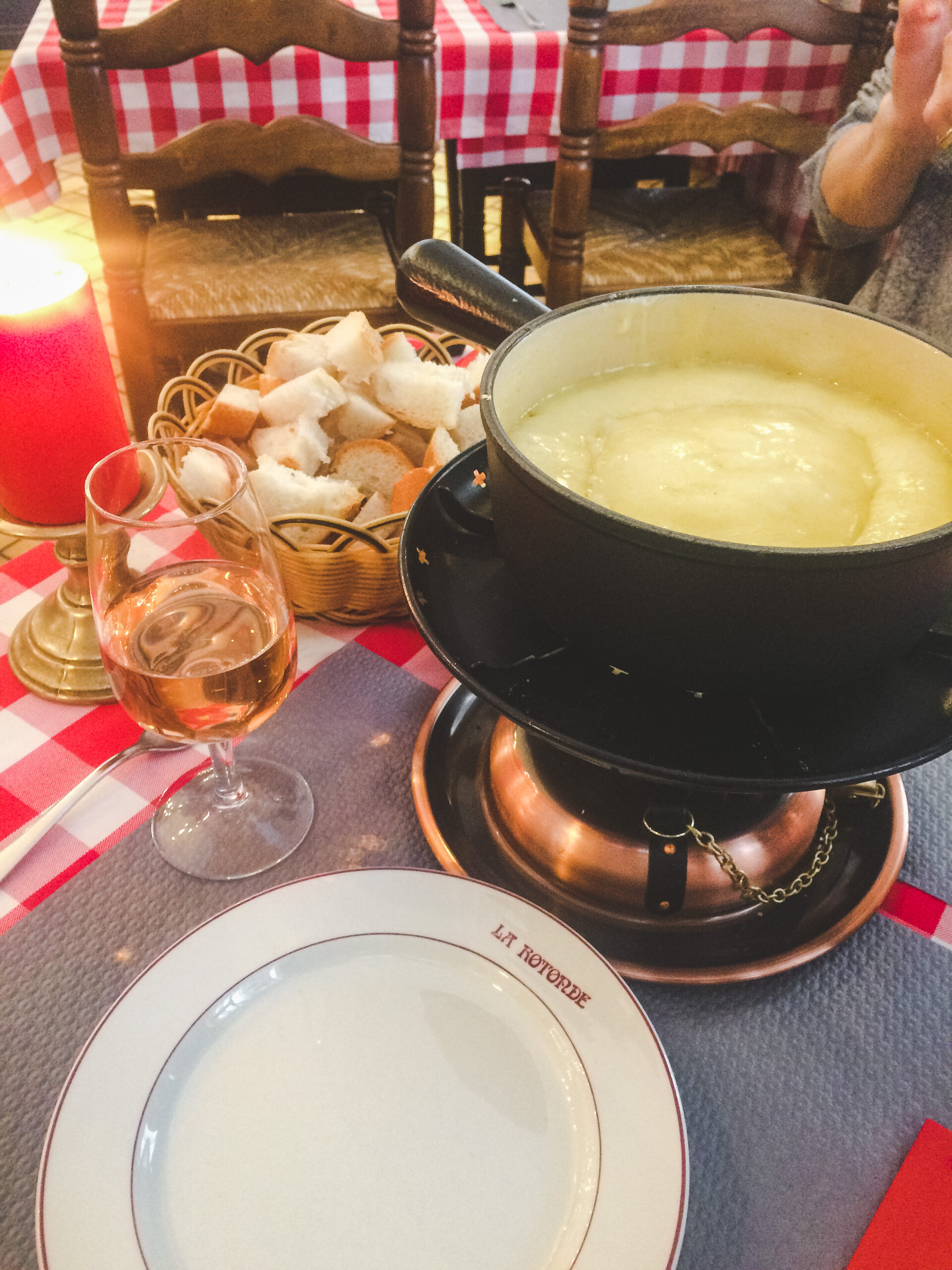 Eating delicious cheese fondue, a must-do in Switzerland!