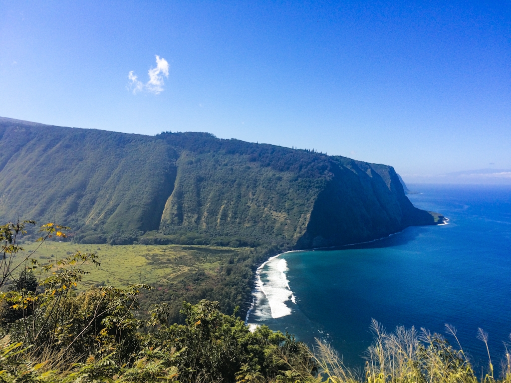 Waipi‘o Valley is one of the Big Island’s most iconic views. Located at the end of Hwy 240, this lookout offers a stunning view of the lush valley below. 