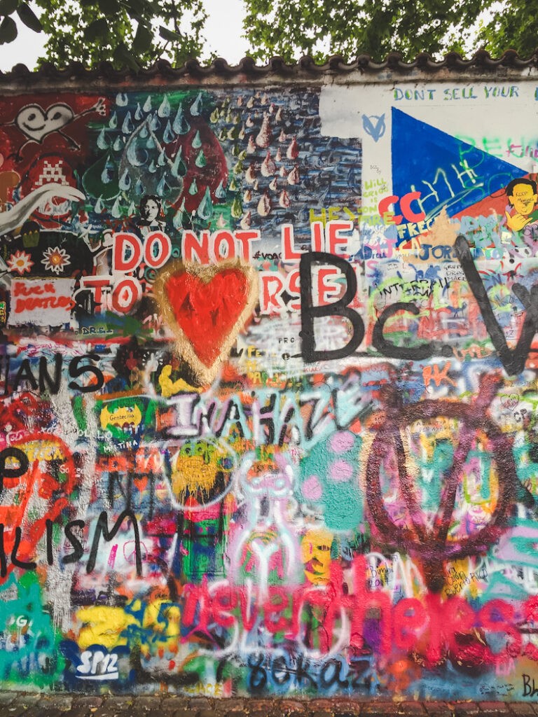 After his murder in 1980, John Lennon became a pacifist hero for many young Czechs who painted images of Lennon, political graffiti, and Beatles lyrics on the newly named John Lennon Wall.